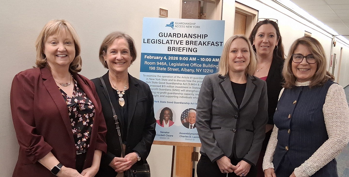 A group of women smiling.