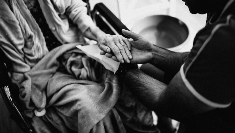 Holding hand of an elder