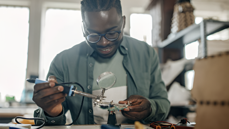 black man with glasses.